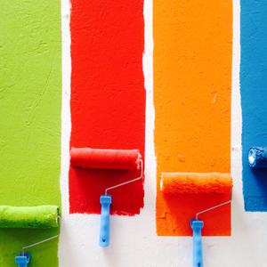 Green, red, orange and blue paint on wall